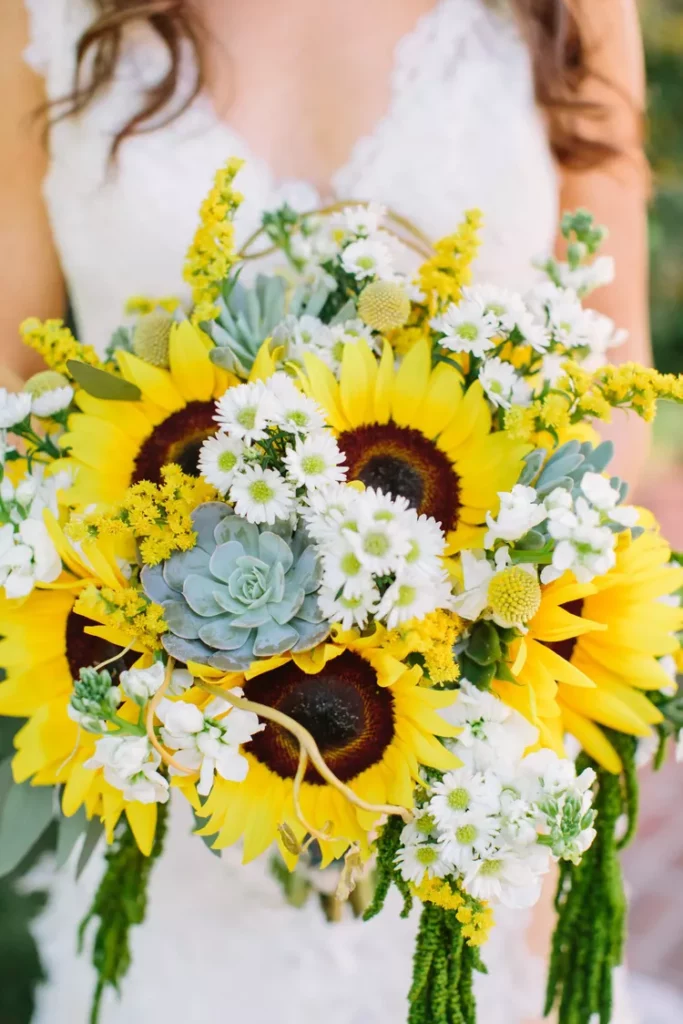 bright yellow sunflower with succulent and greenery wedding bouquet