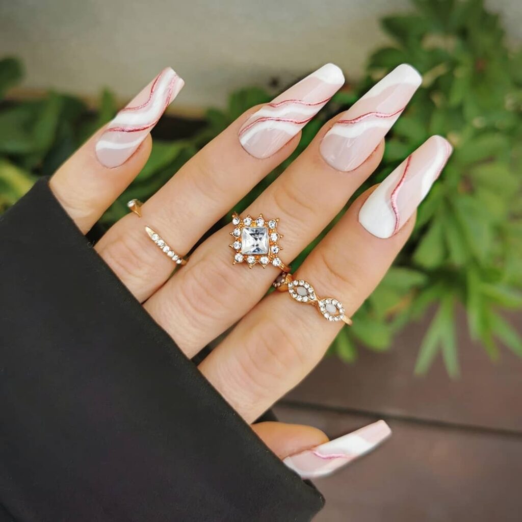 Amazon.com: Hypnaughty 24 Pcs Paris Classy French Coffin Press On Nails  with Design and Glue Medium Long Fake Nails Nude Pink and White  Asymmetrical French Tip Glue On Nails Full Cover (Paris) :