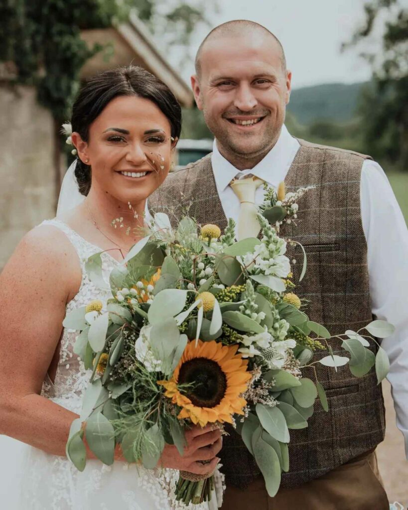 greenery wedding bouquet with sunflower and craspedia