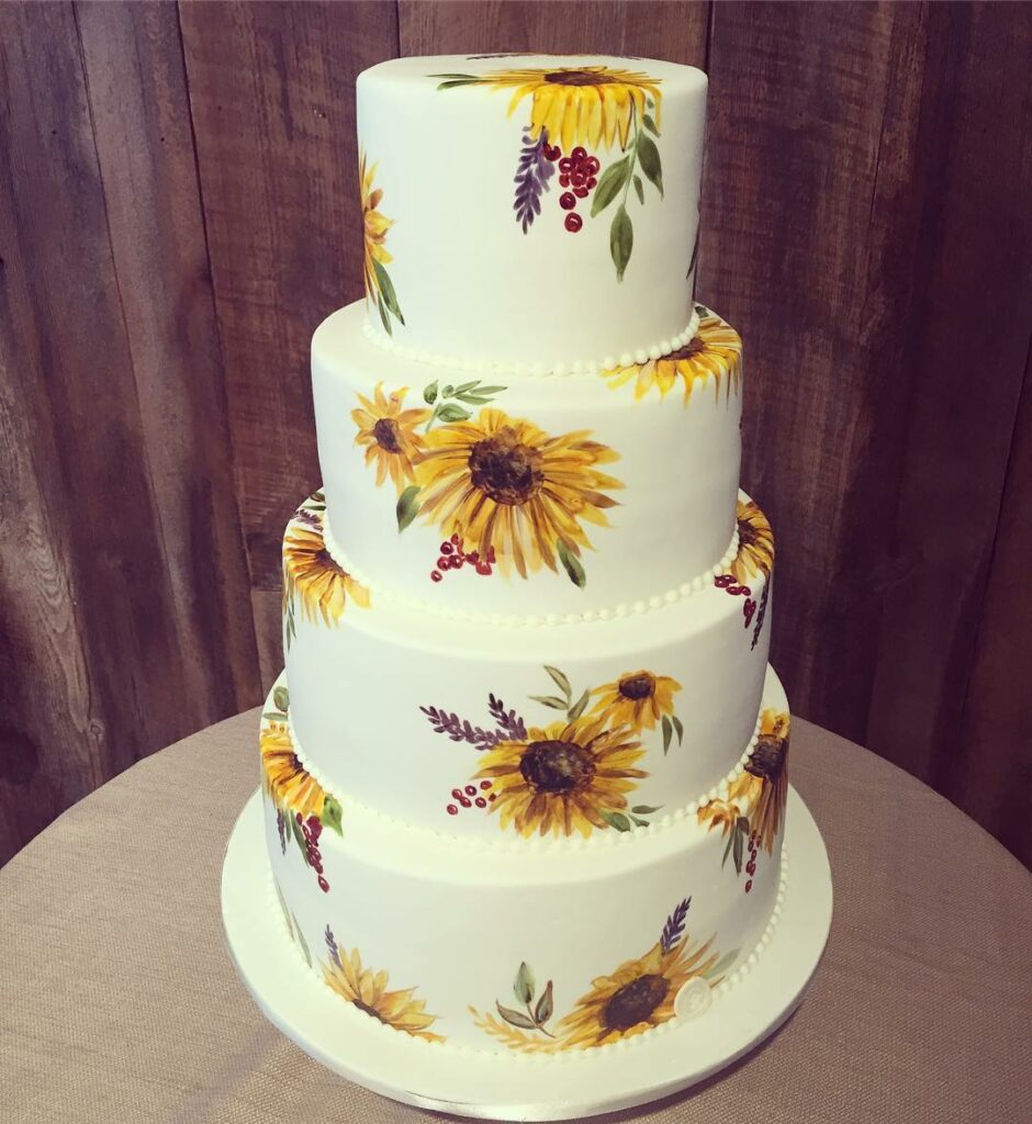 hand painted four tier sunflower wedding cake