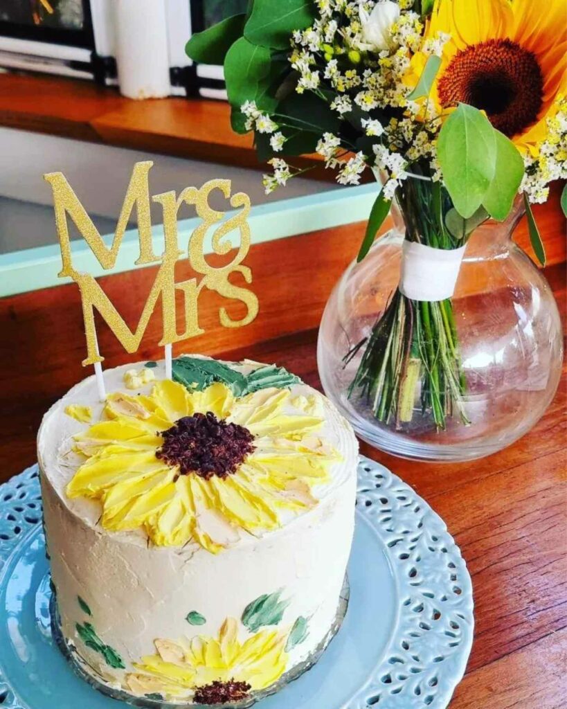 hand painted sunflower intimate wedding cake
