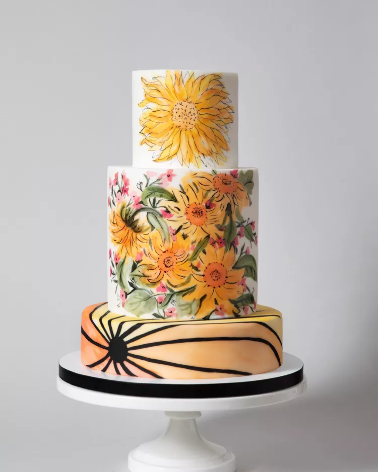 hand painted with sunflowers and blooms three tier wedding cake