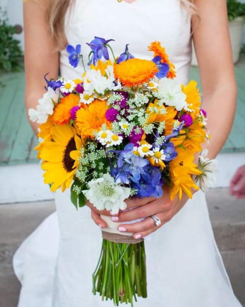 mixed sunflower colorful wedding bouquet with blue delphinium