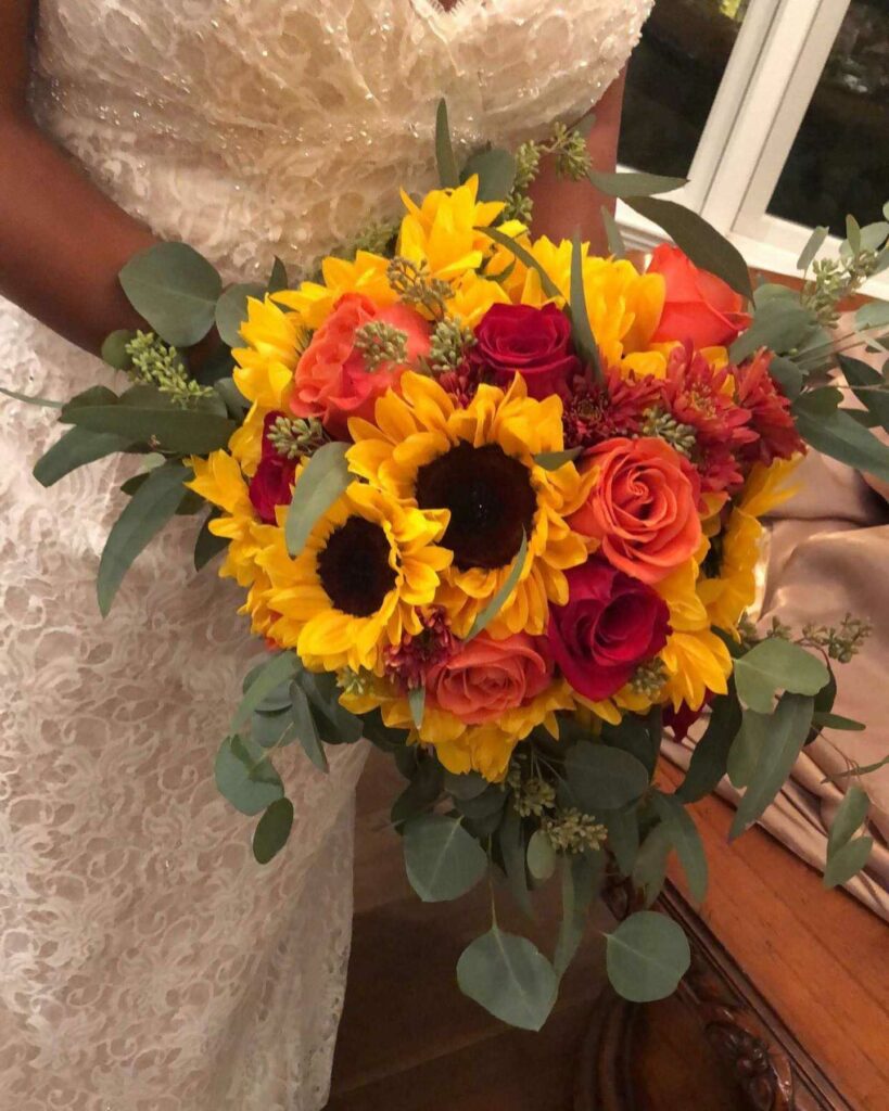 red and orange sunflower autumn wedding bouquet