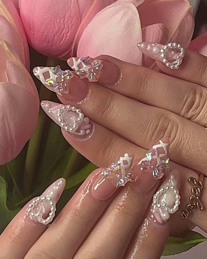 romantic and classy pink pearl bridal nails art