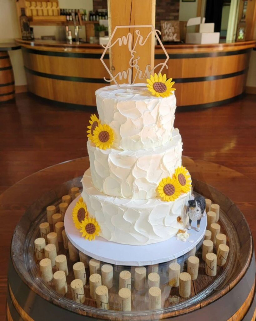 simple sunflower carrot wedding cake with cream cheese