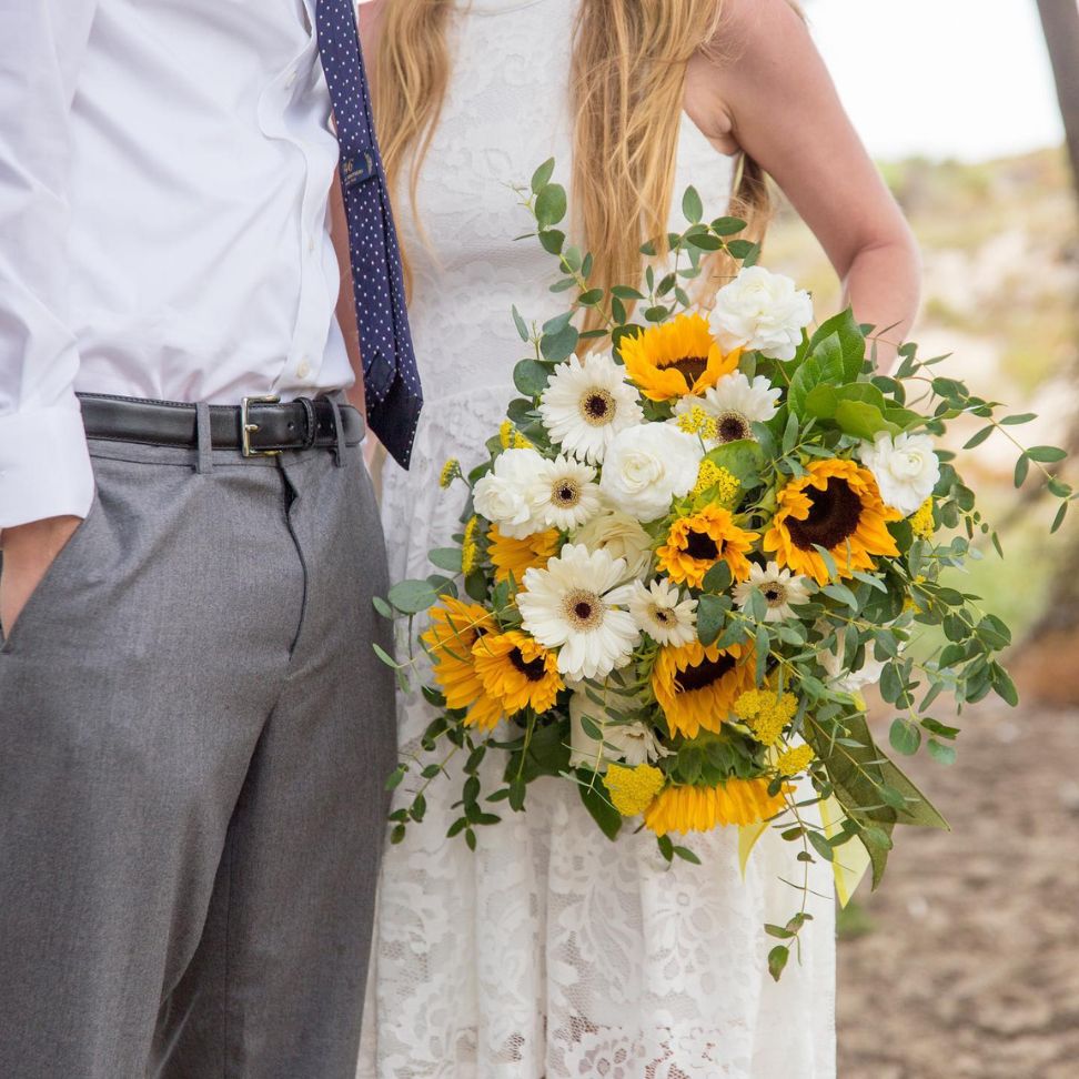 simple white and green sunflower beach wedding bouquet