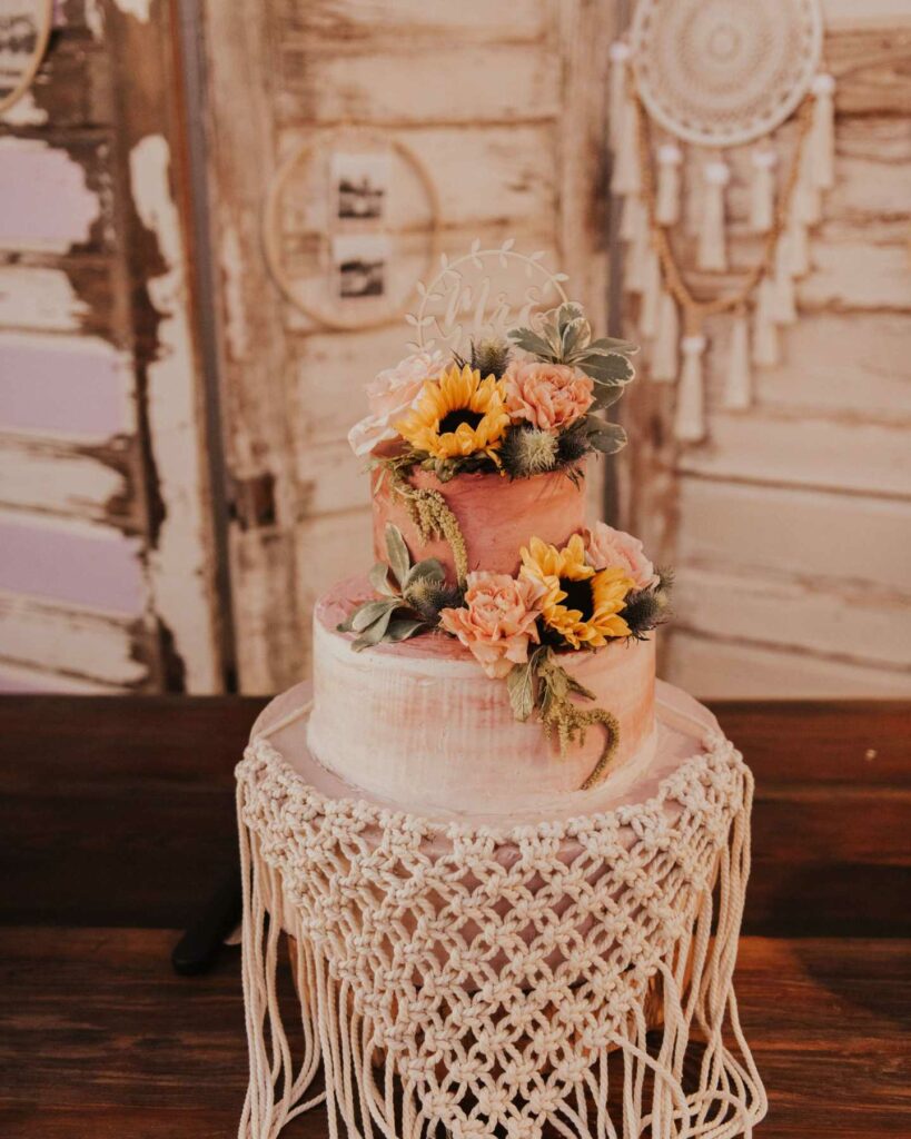 sunflower theme boho inspired wedding cake with macrame