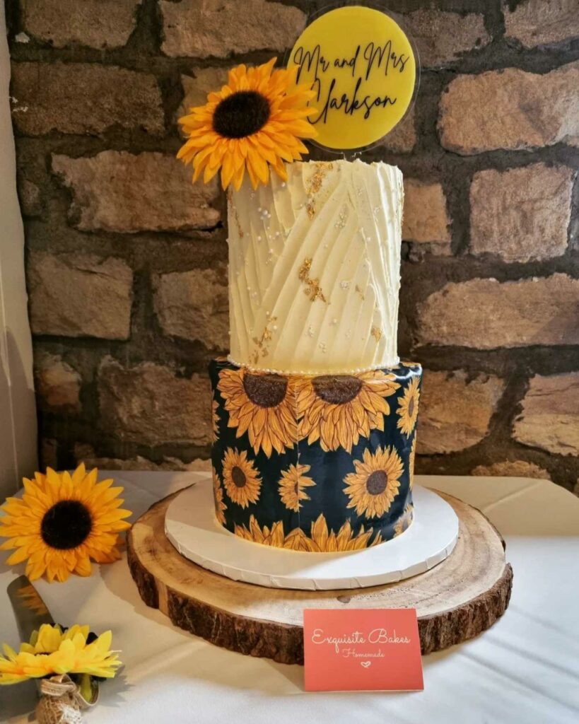 sunflower themed tiered wedding cake with textured wrap