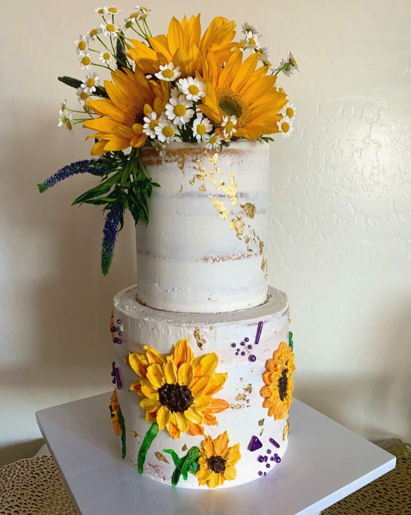 sunflower themed with topper wedding cake