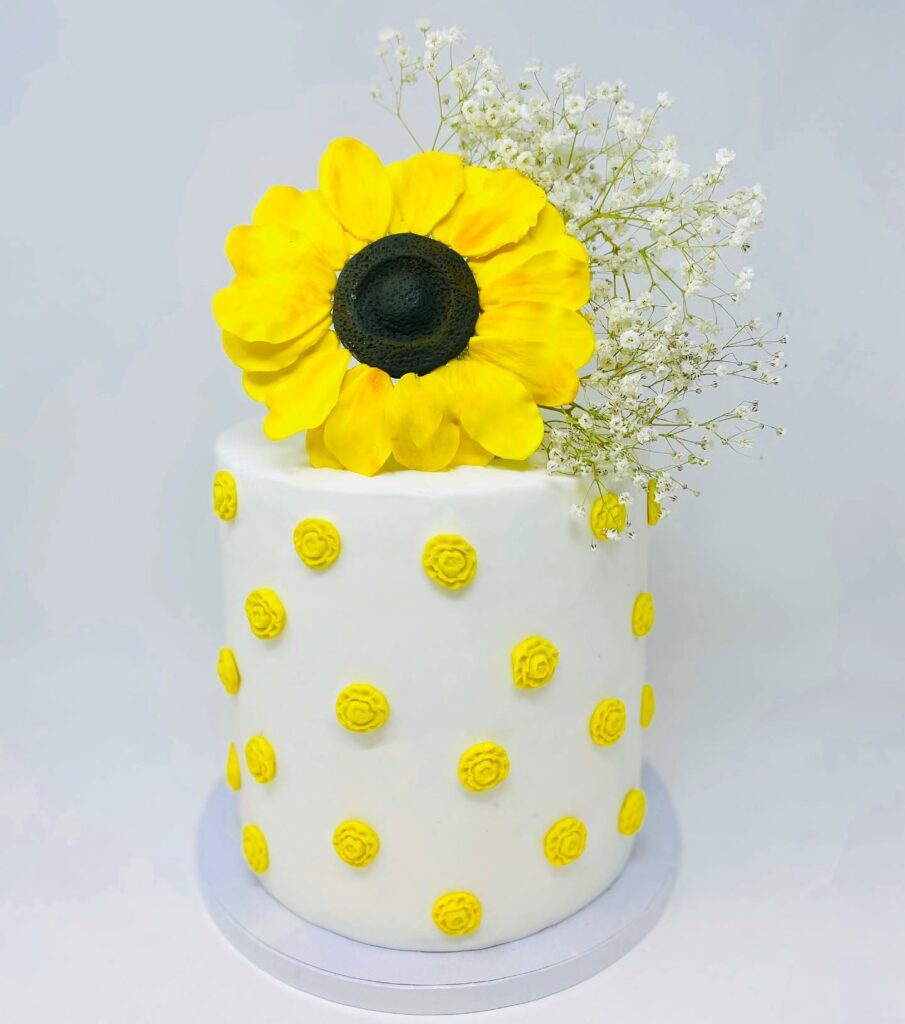 sunflower topper and baby's breath mini wedding cake