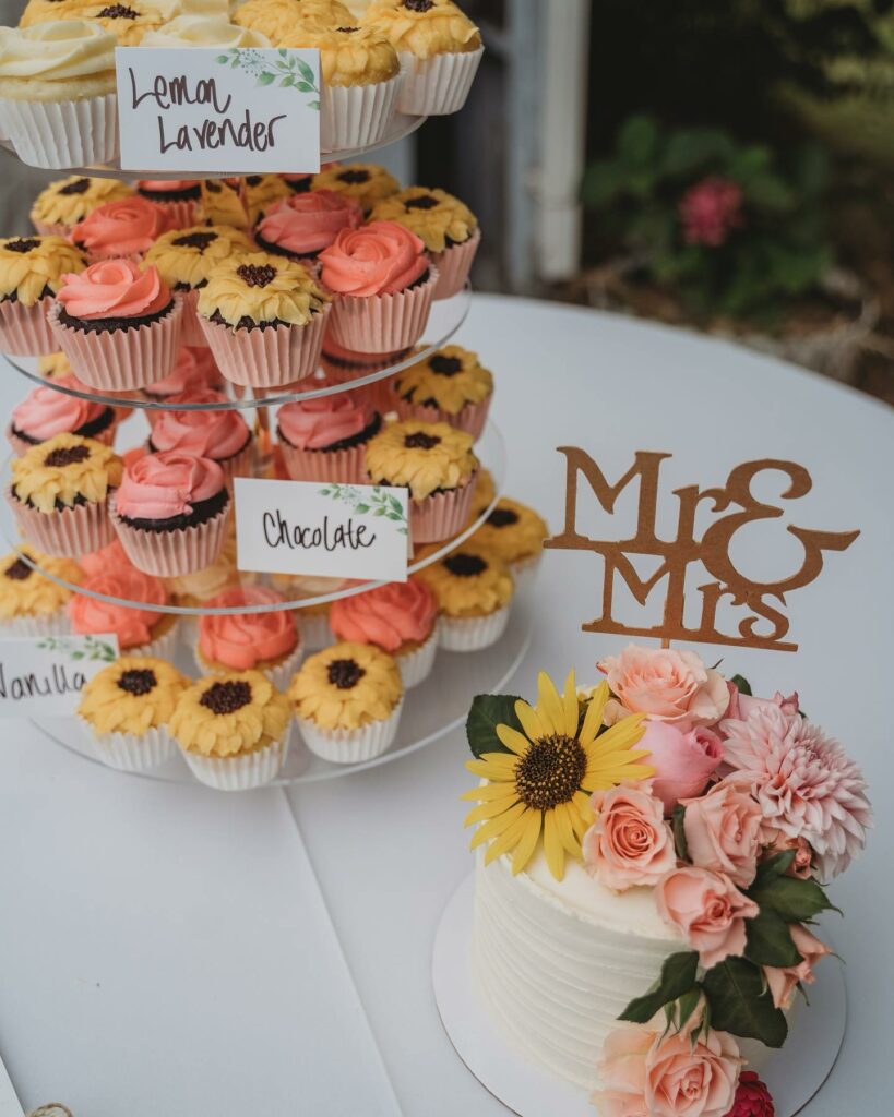 sunflower wedding cupcake tower with floral sunflower cake