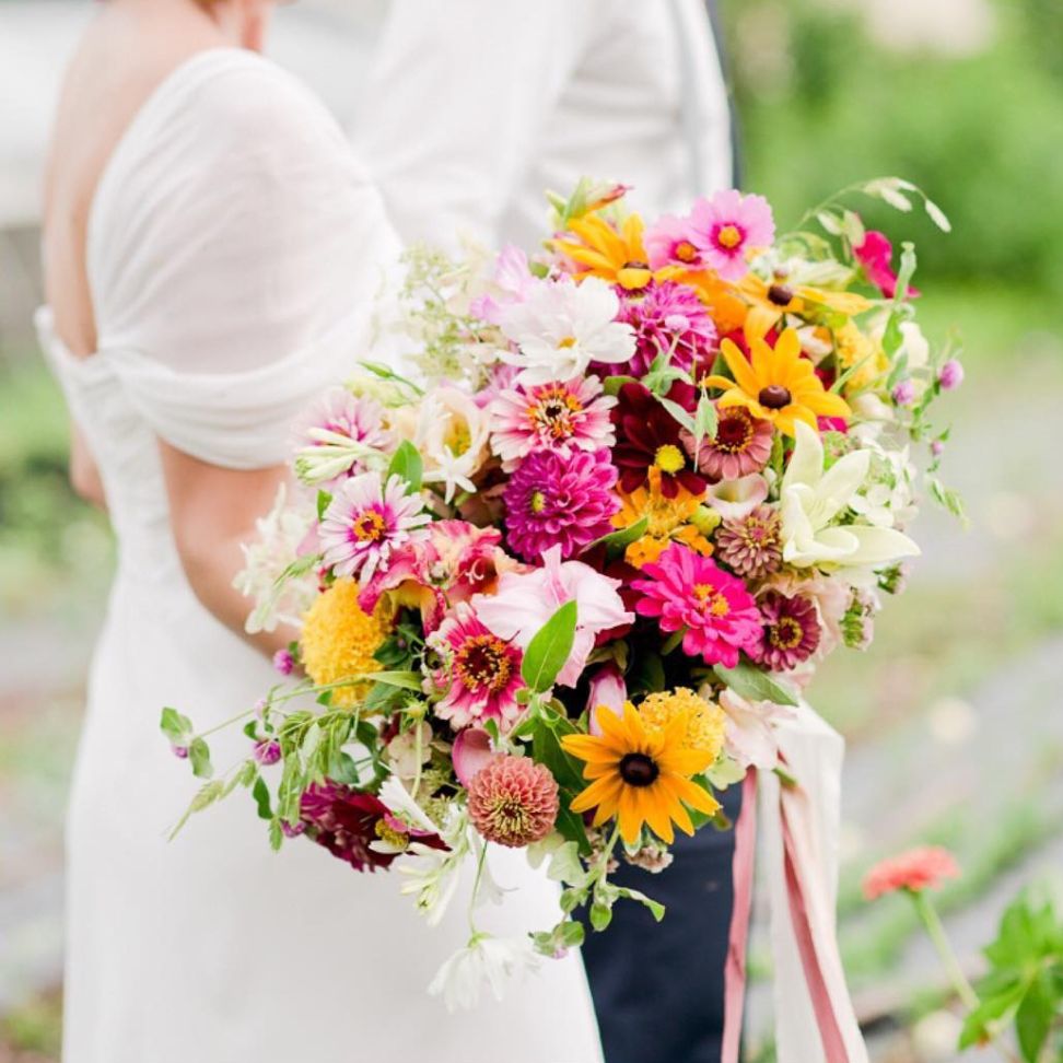 sunflower with pops of bold color wedding bouquet