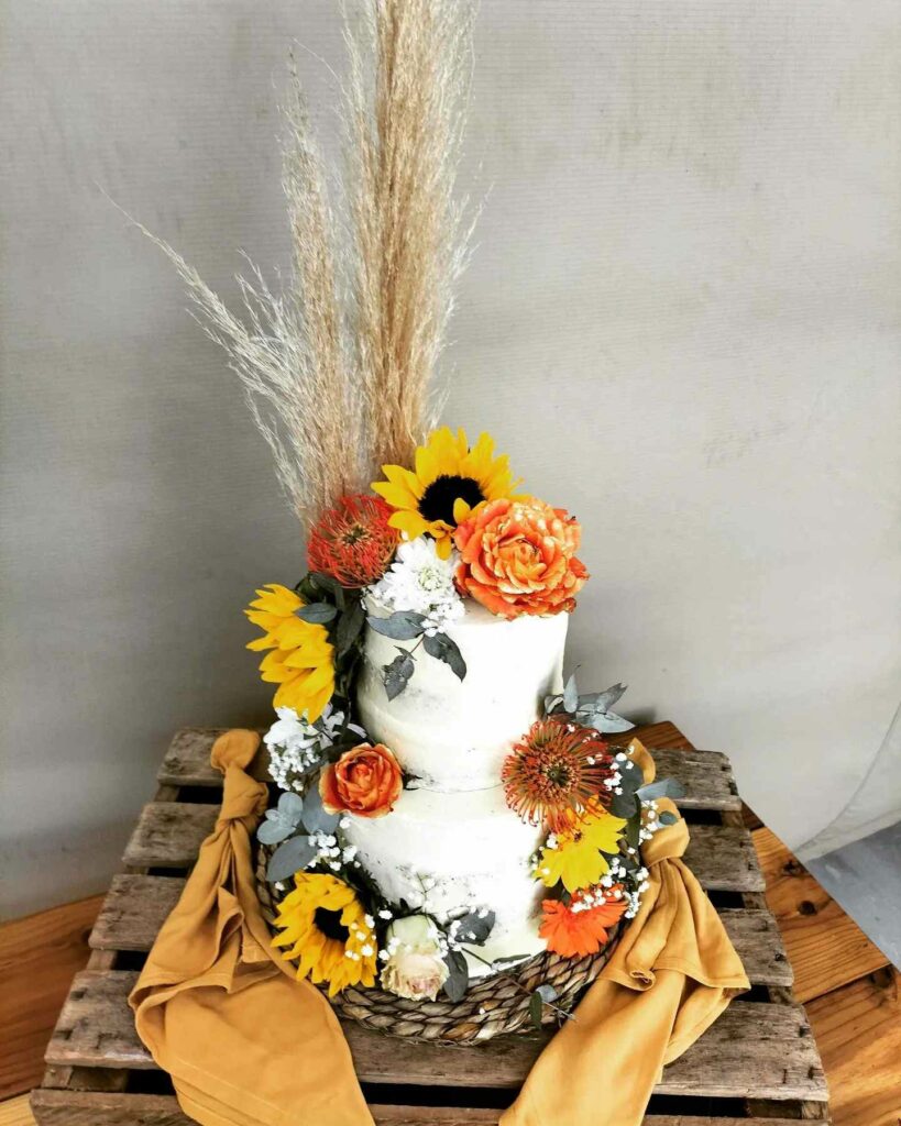 two tier sunflower rustic boho wedding cake