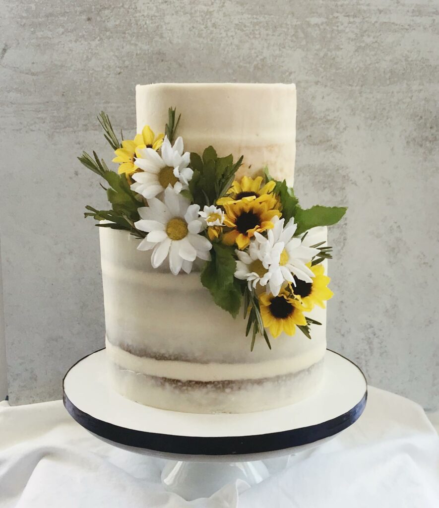 vanilla and lemon sunflower buttercream wedding cake