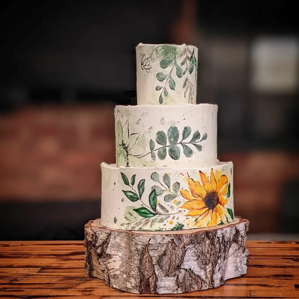 watercolor sunflower themed rustic wedding cake