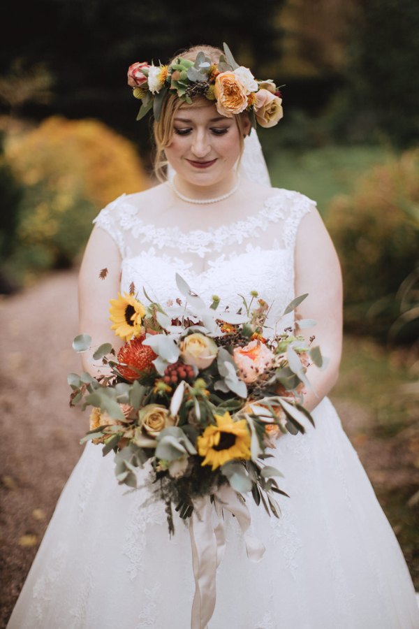 yellow and red sunflower rustic barn wedding bouquet