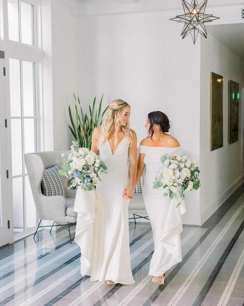gorgeous lesbian wedding outfit with elegant bouquet