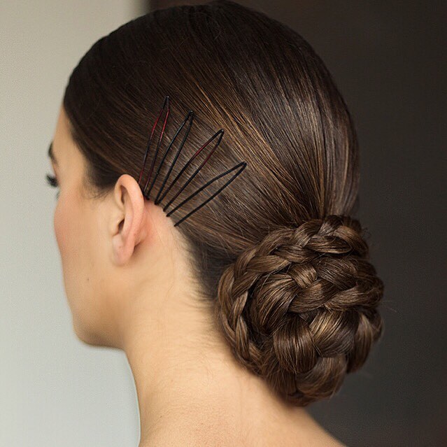 black braided bun wedding hairstyle
