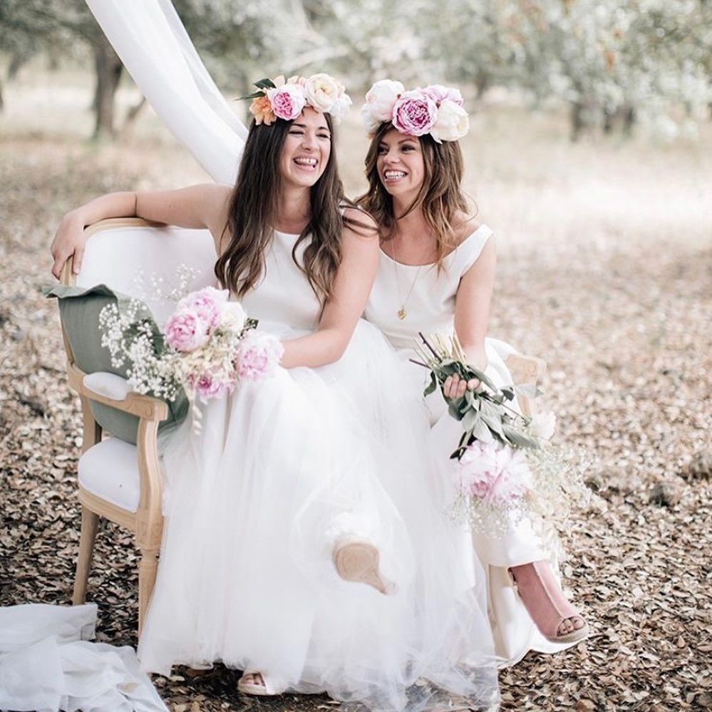 blush themed lesbian outdoor wedding outfits with crown