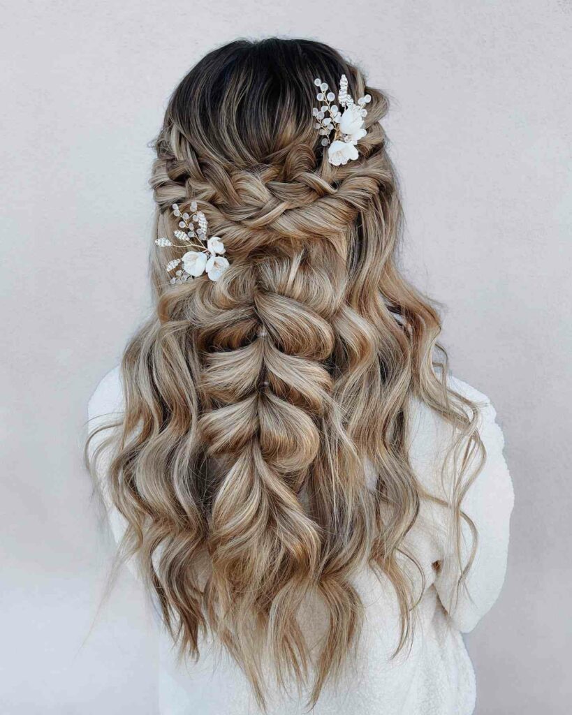 bohemian style half up braided hairstyle for rustic wedding