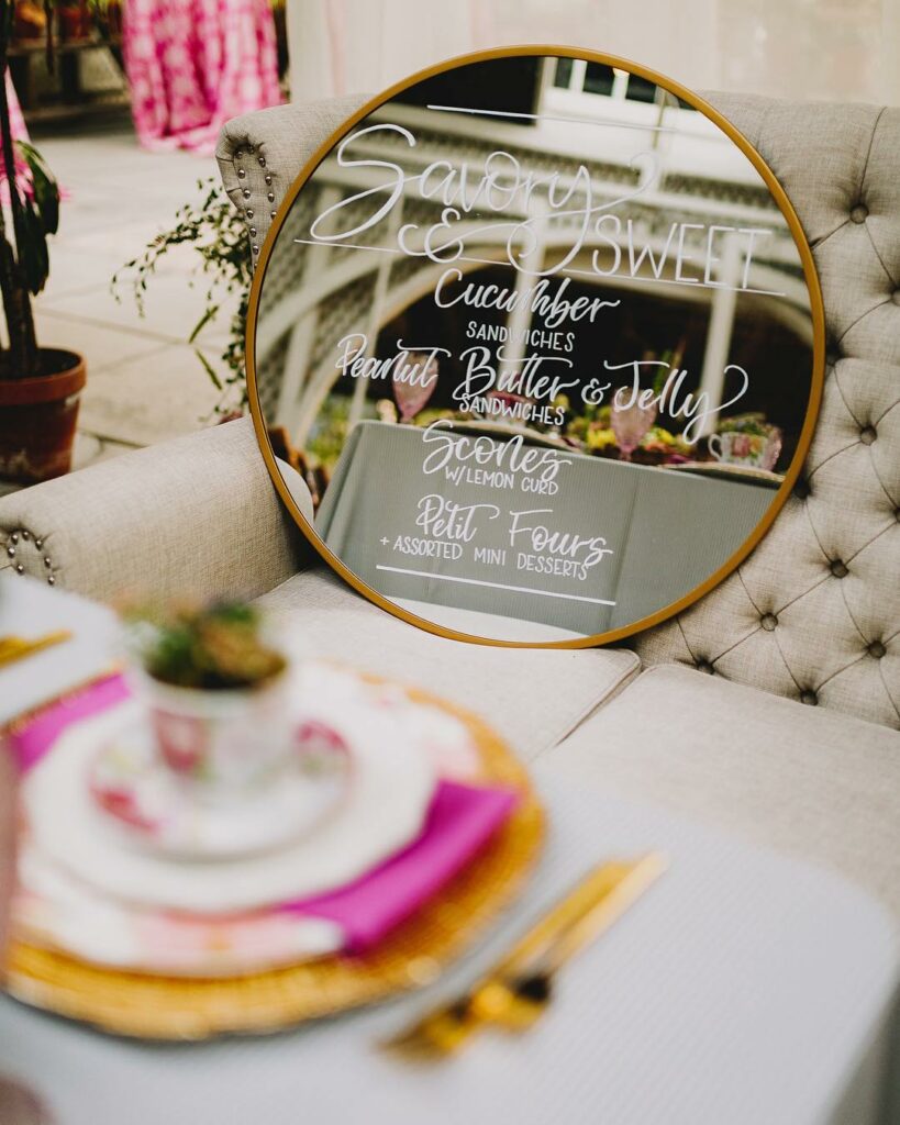 circle mirror garden wedding menu sign with calligraphy