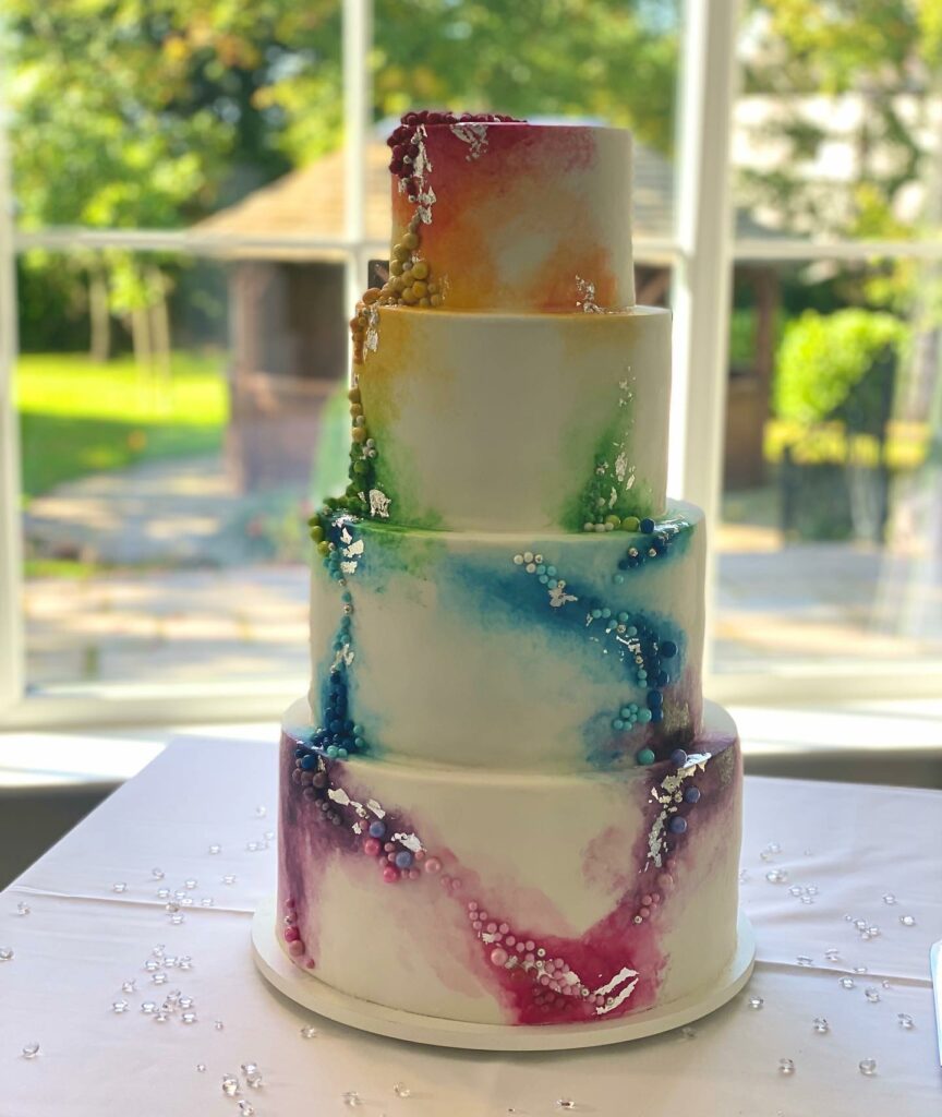 colorful four tiered lesbian autumn wedding cake