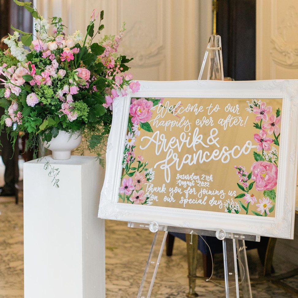 elegant pink floral mirror welcome sign for vintage inspired wedding