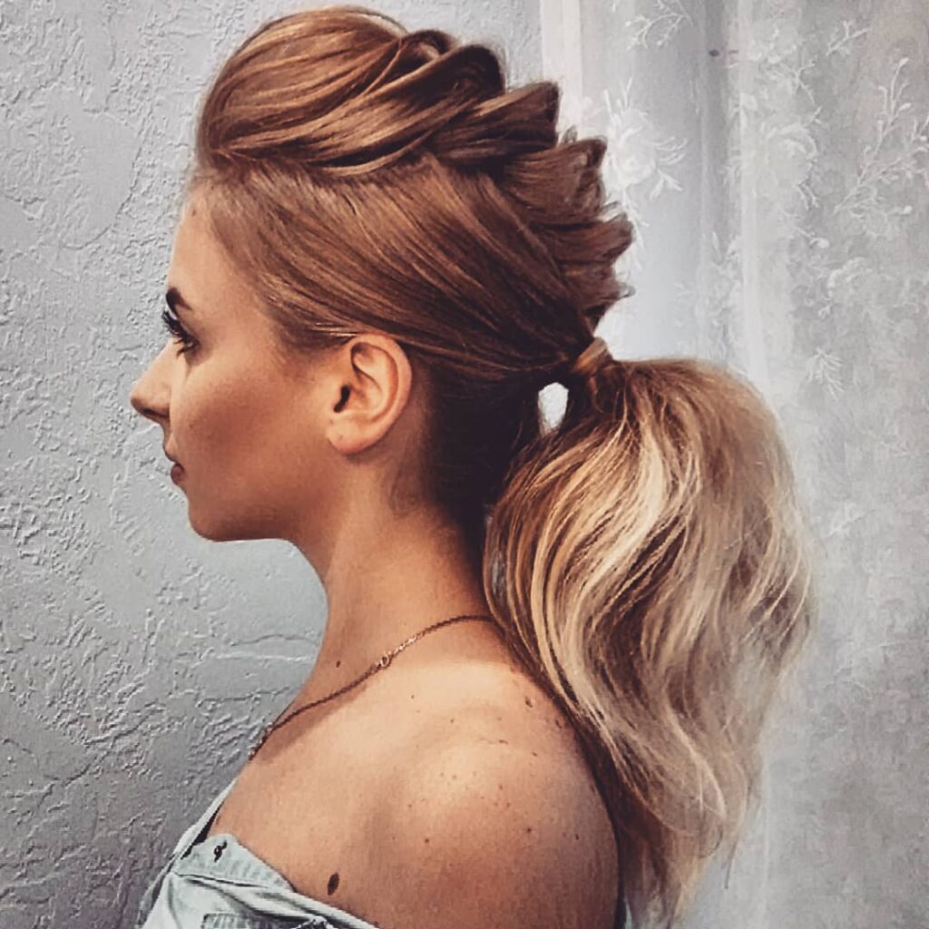 Dutch braid with ponytail medium wedding hairstyle
