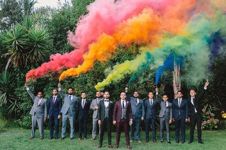 gay wedding ideas with rainbow smoke bombs