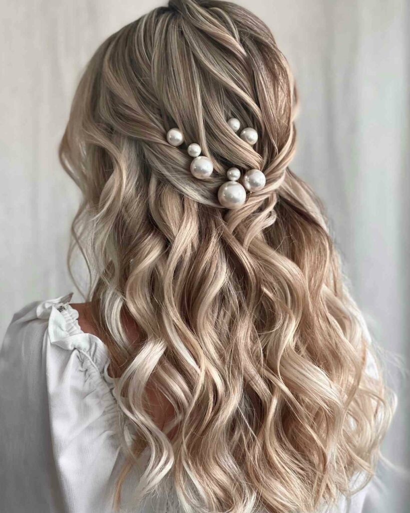half up pearl adorn thin bohemian wedding hairstyle