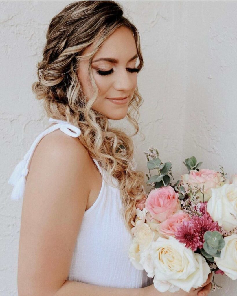 half up side swept fish tail braided wedding hairstyle for boho bride