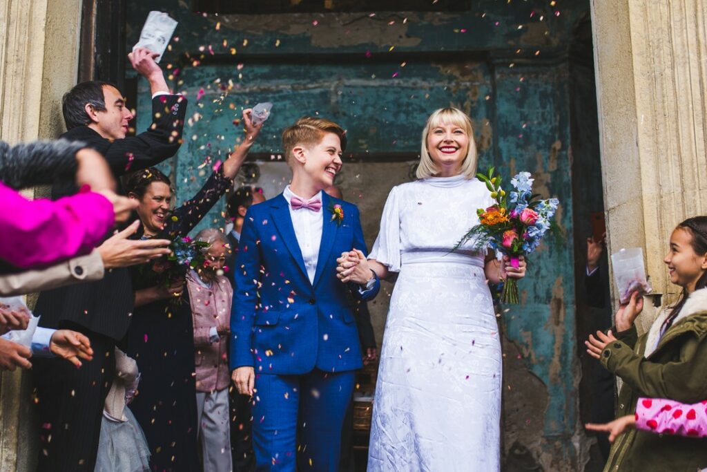 lesbian wedding photo with love and laughter