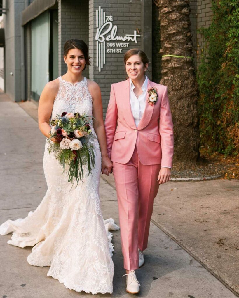 lovely lesbian gown and pink wedding suit