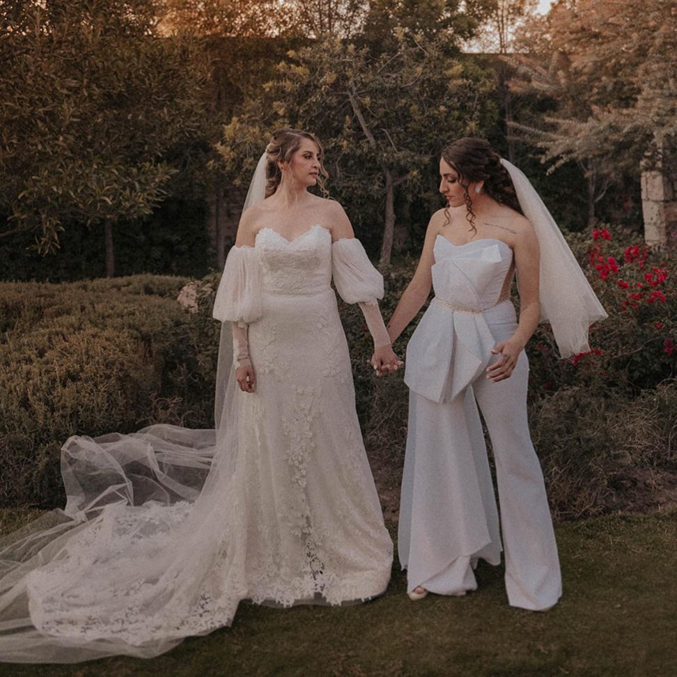 matching white same sex wedding dress with veils