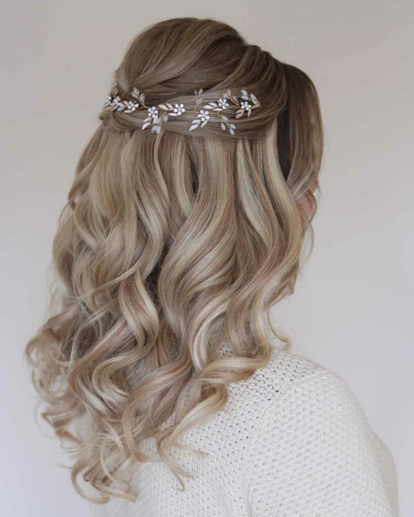 medium hair half up half down wedding hairstyle for bridesmaid