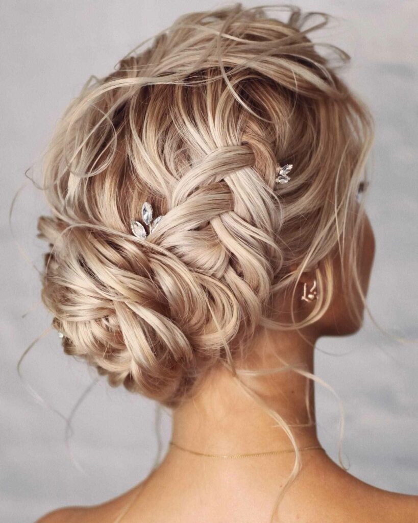 messy updo with braided bridal thin hairstyle