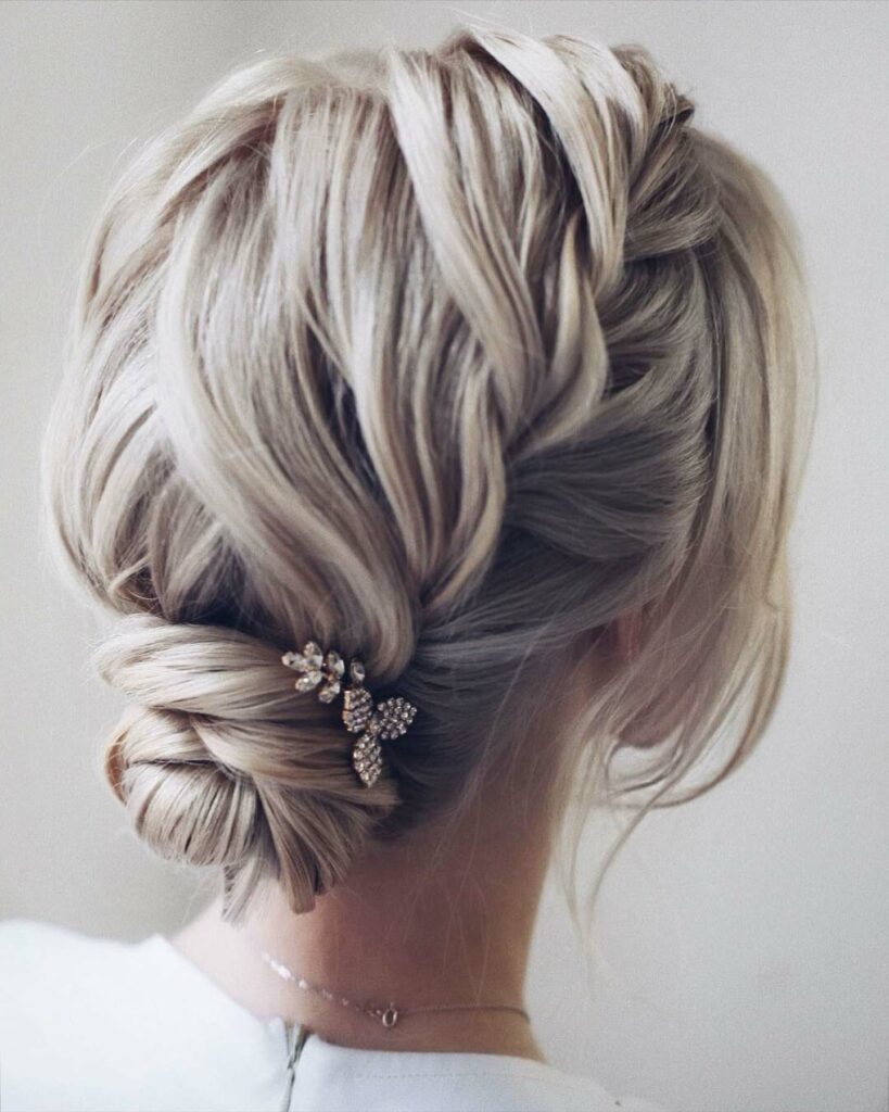 simple side braided wedding low bun hairstyle for thin hair