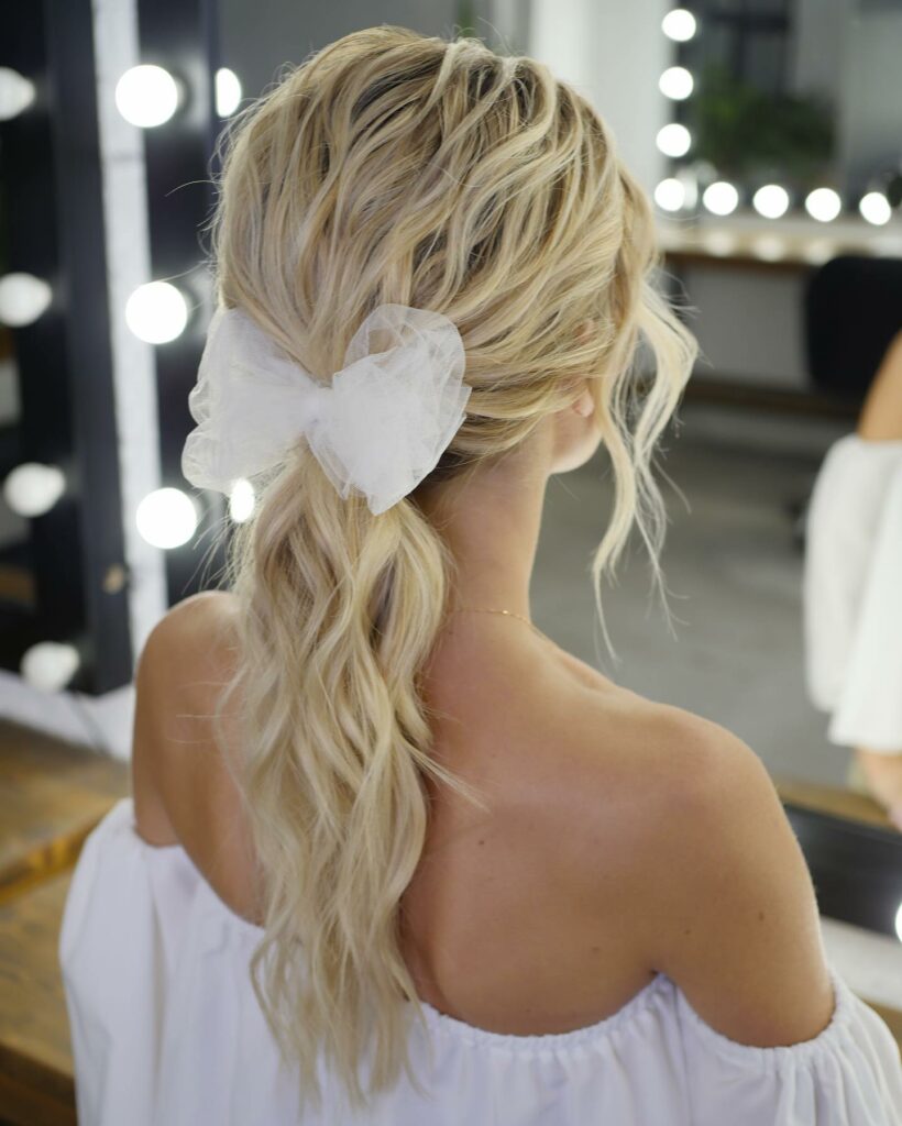 simple textured ponytail wedding hairstyle for thin hair