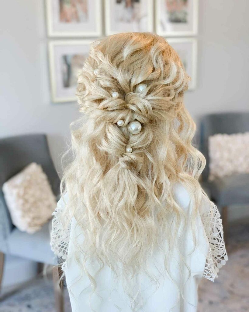 textured braided long and thin pearl adorn wedding hairstyle