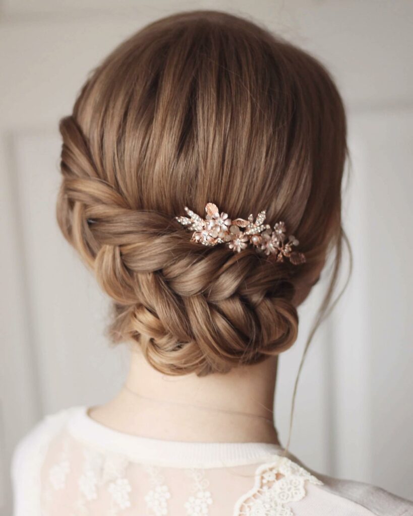 textured updo wedding hairstyle with braid for elegant bride