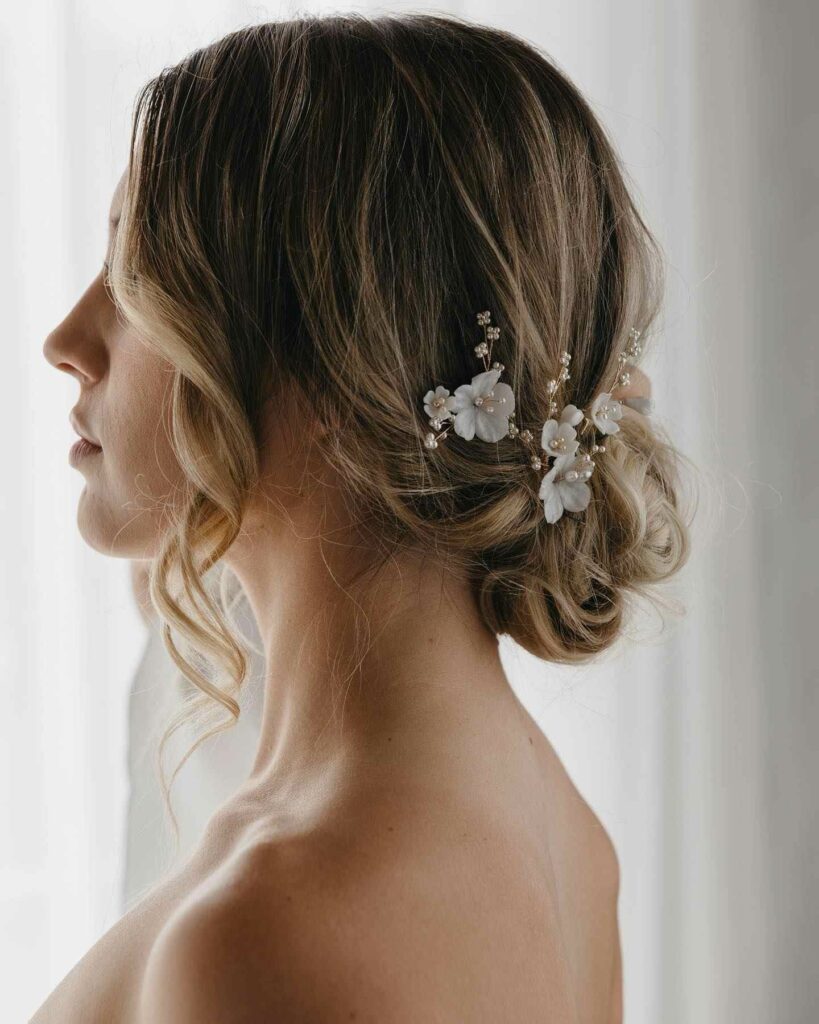 thin hair bridal hairstyle with flower pins for spring wedding