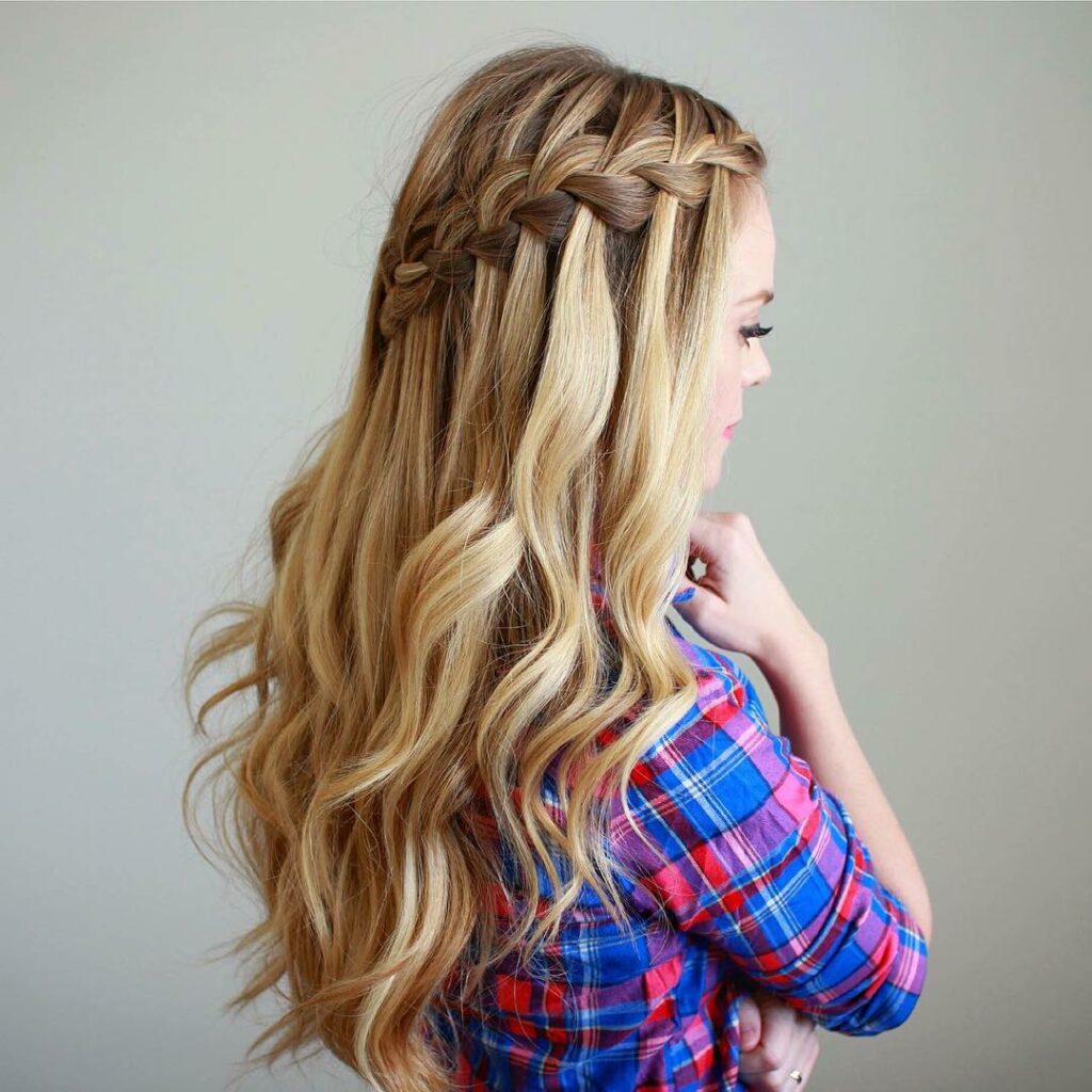 waterfall braided bridal hairstyle for fall wedding