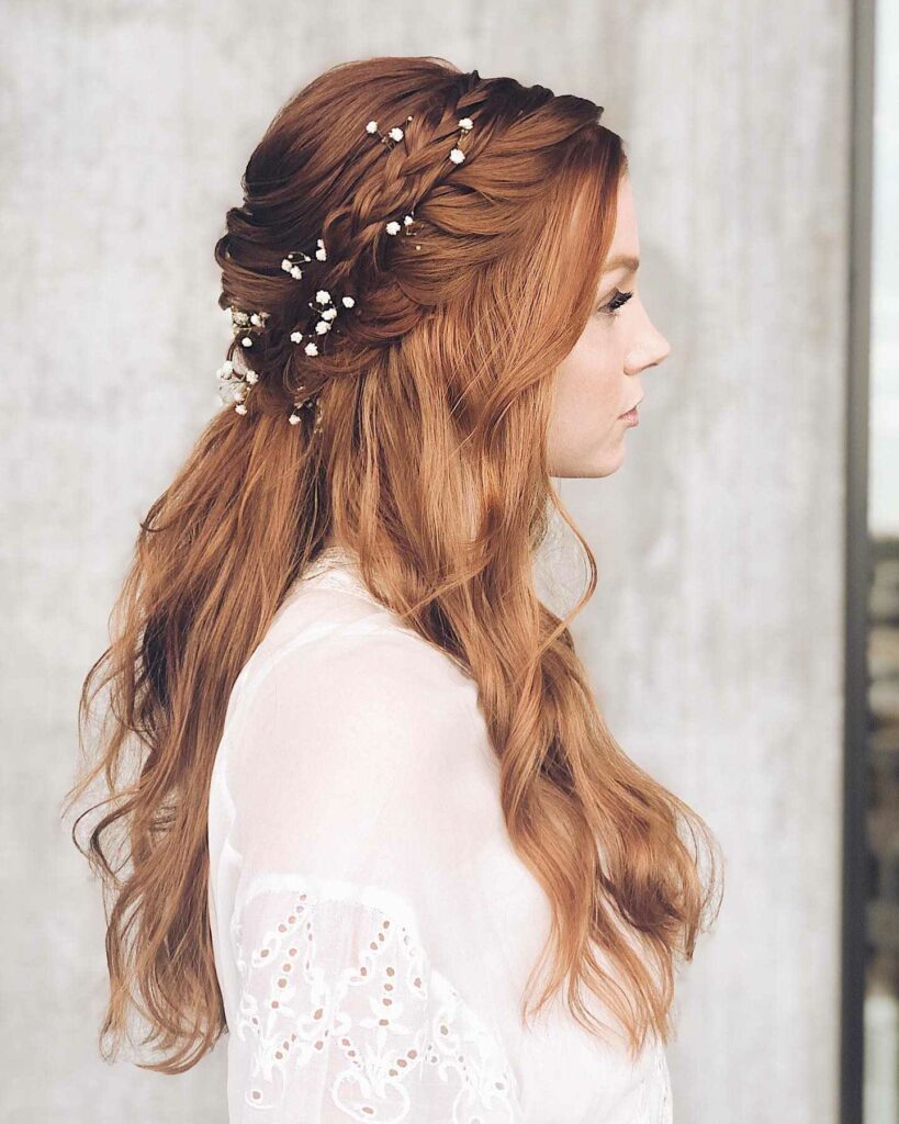 waterfall braided half up wedding hairstyle
