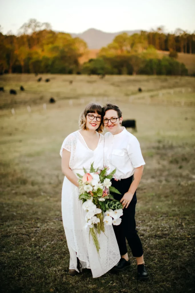 wedding gown and pant shirt lesbian bides black and white outfits