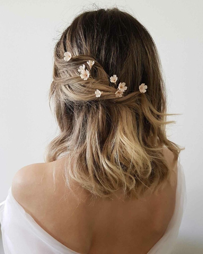 wedding hairstyle with champagne tone pins for medium thin hair