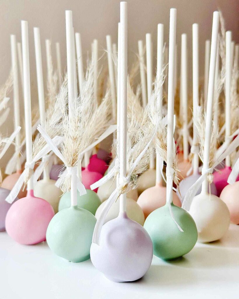 multicolored frosting wedding cake pops
