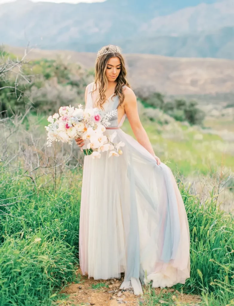 pastel rainbow wedding gown with tulle and chiffon details