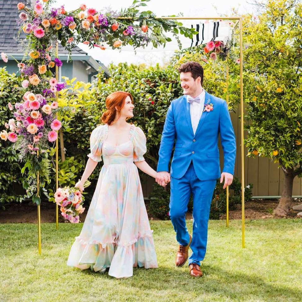 rainbow pastel color fairytale wedding gown for backyard wedding