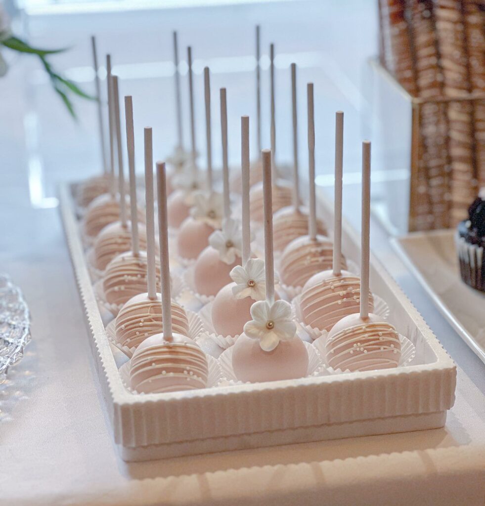 textured dipped chocolate pink wedding cake pops